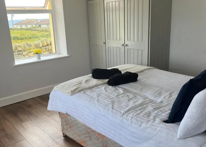 Проживание в семье Pier View House *